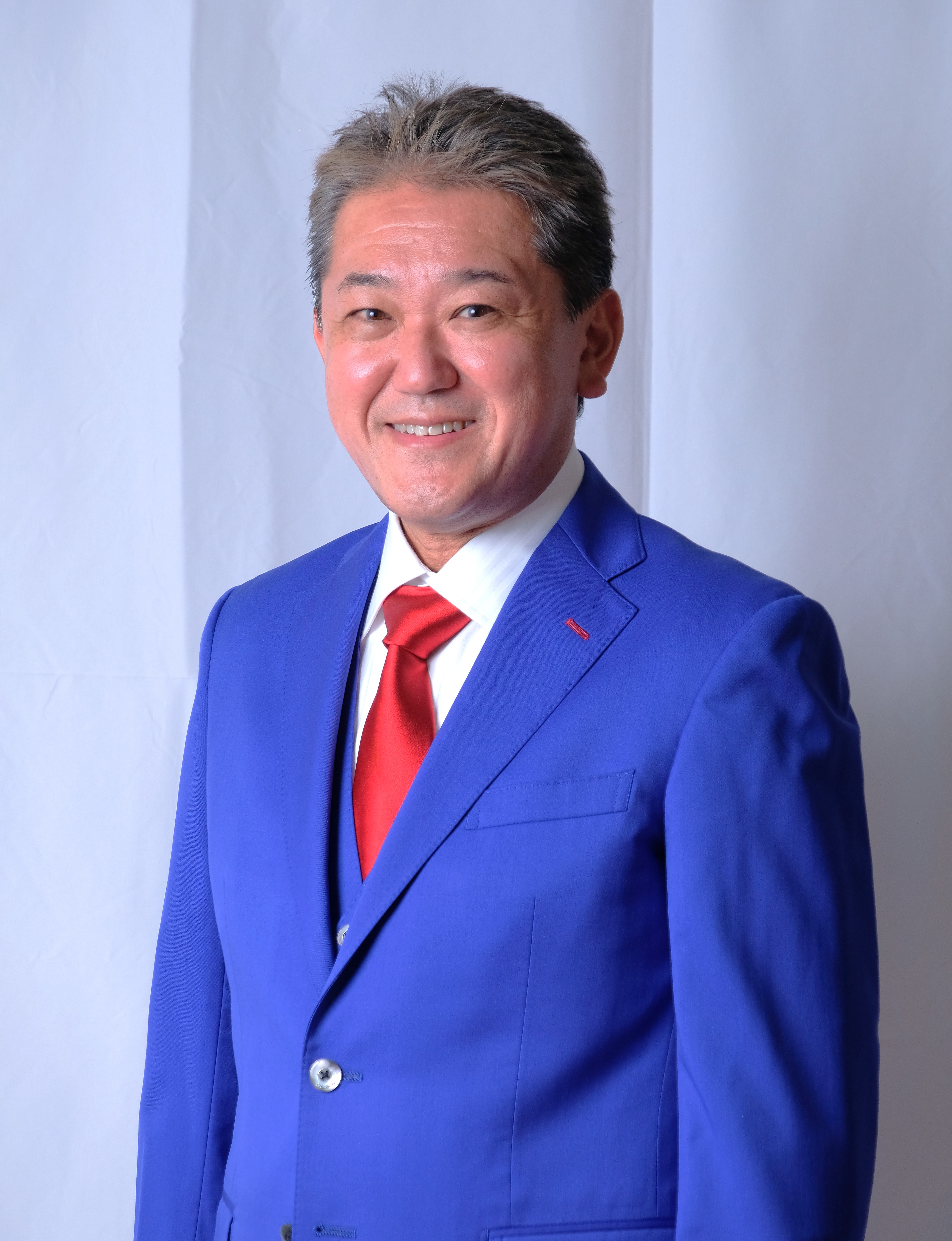 微笑む吉野敏明